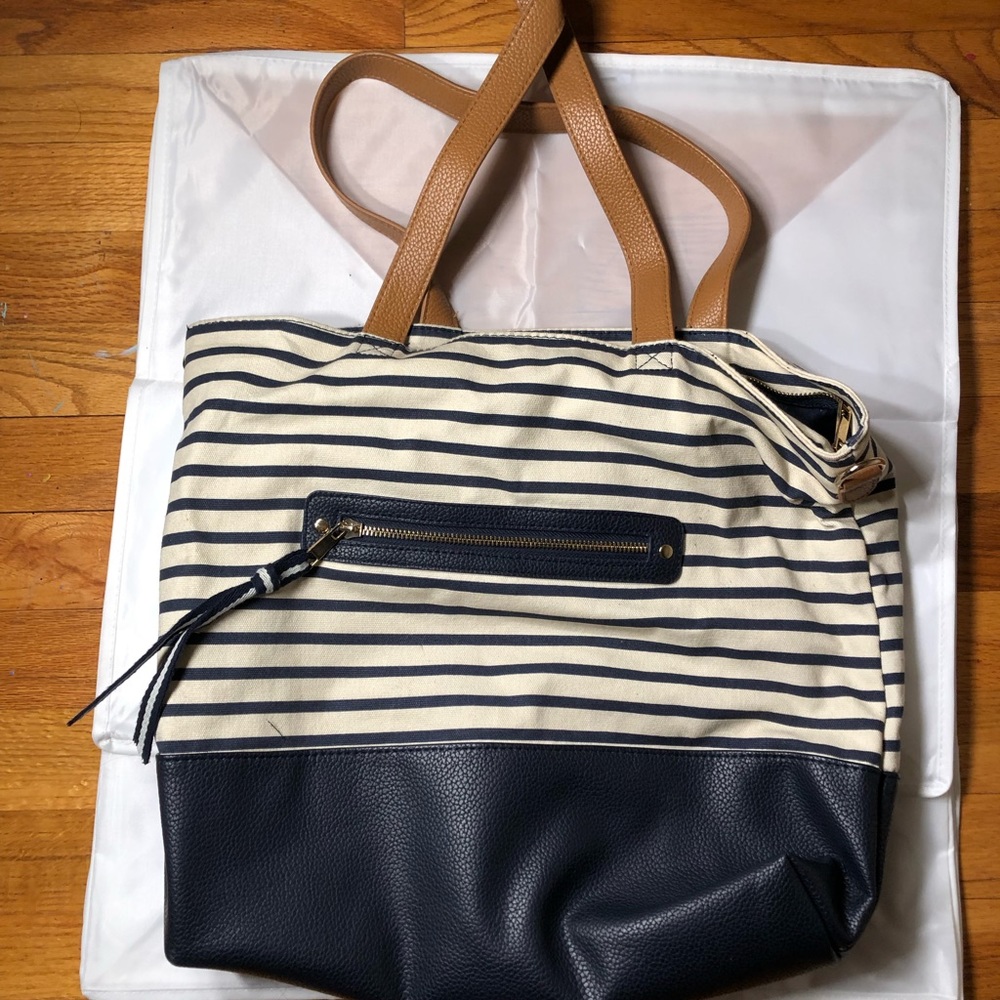 Over the shoulder, cloth target bag.